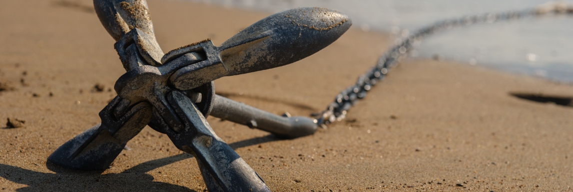 Boat anchor on a beach
